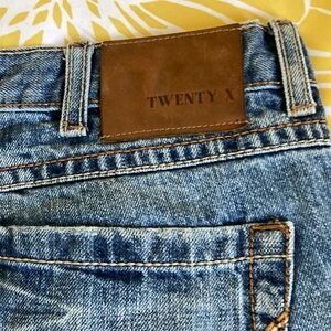 Twenty Blue Jeans with Distressed Look and Contrast Stitching